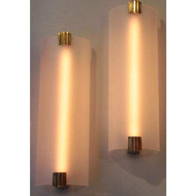 These French wall lights probably come from a cinema or hotel. The very elegant and reduced form consists of a glass semi-...