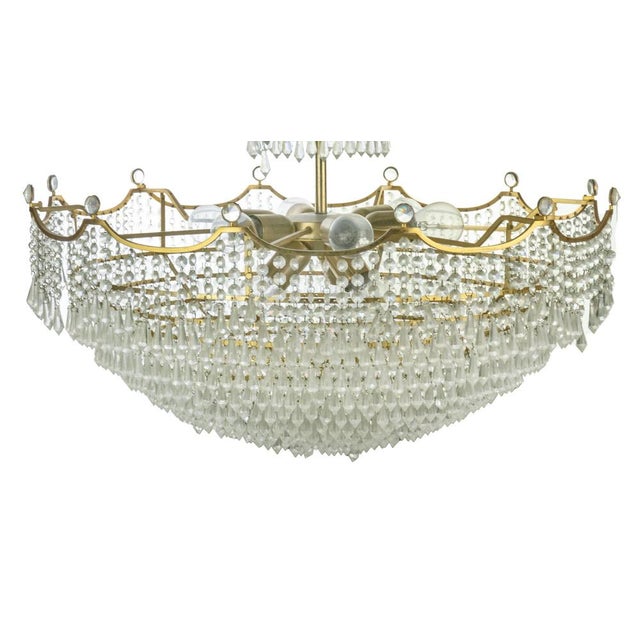 Crystal Drops Chandelier, Italy 1970s. Gilded Brass, 10 lights. Very good condition. Up to 250V (Europe/UK Standard).The...