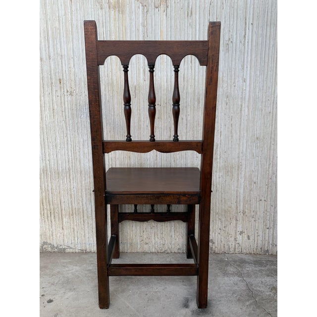 Early 20th Set of Four Spanish Carved Chairs with Wood Seat For Sale - Image 12 of 18