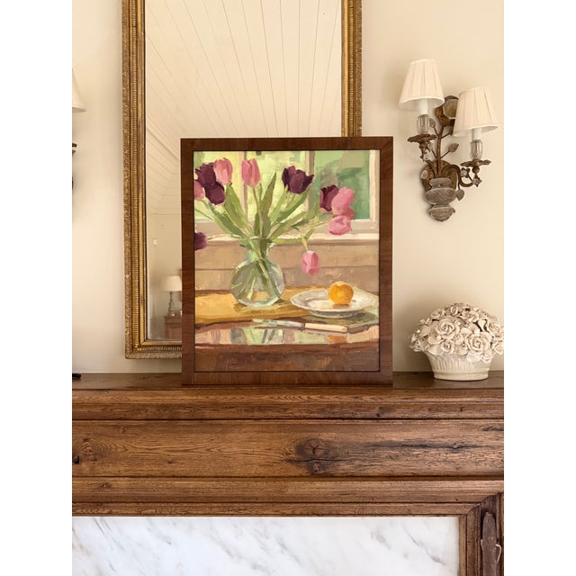 This still life painting is a beautiful scene of tulips set in front of the window. I love the light and composition in...