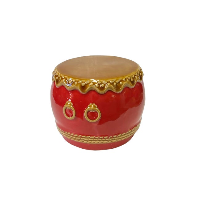 This is a handmade Chinese accent decorative display figure in a traditional drum shape with red color finish and apron...