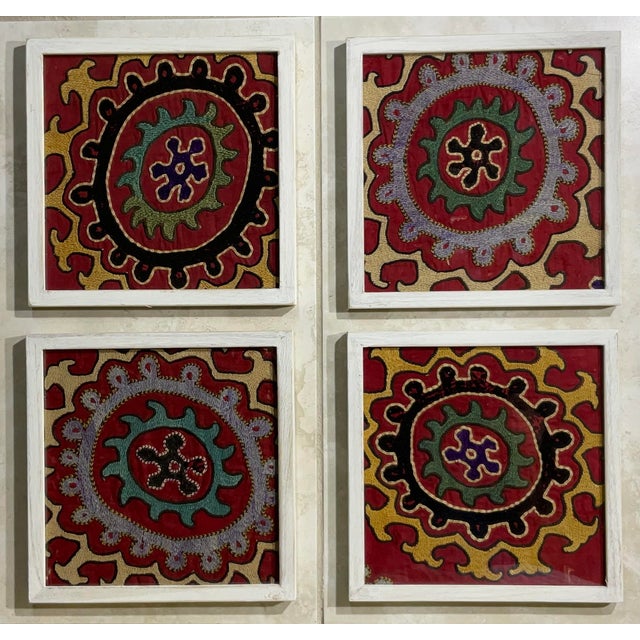 Exceptional antique hand embroidery fragments of Suzani textile, with circle of life round motif , professionally mounted...