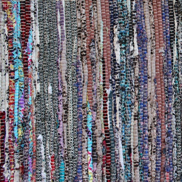 Bright and colorful striped Sari rug made from recycled cotton fabrics repurposed into fun striped rugs. Colors vary and...