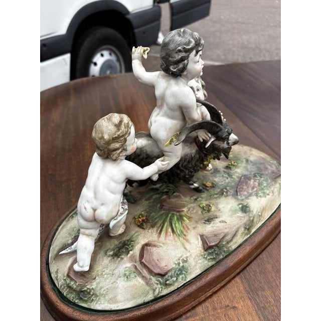 Porcelain Group of Nude Putti & the Goat Amalthea on Wooden Display Stand For Sale - Image 15 of 16