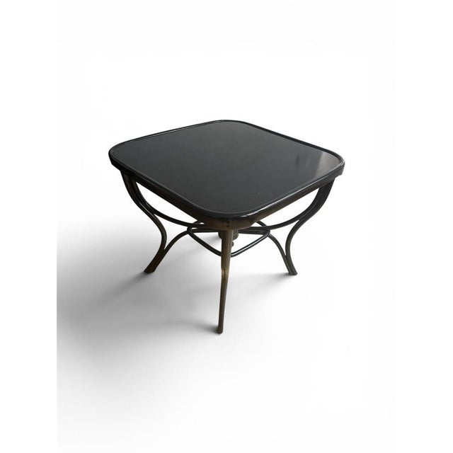 Original Thonet game table, circa 1910 (No. 2616) Material: Bent beechwood Color: Black stained and polished Dimensions:...
