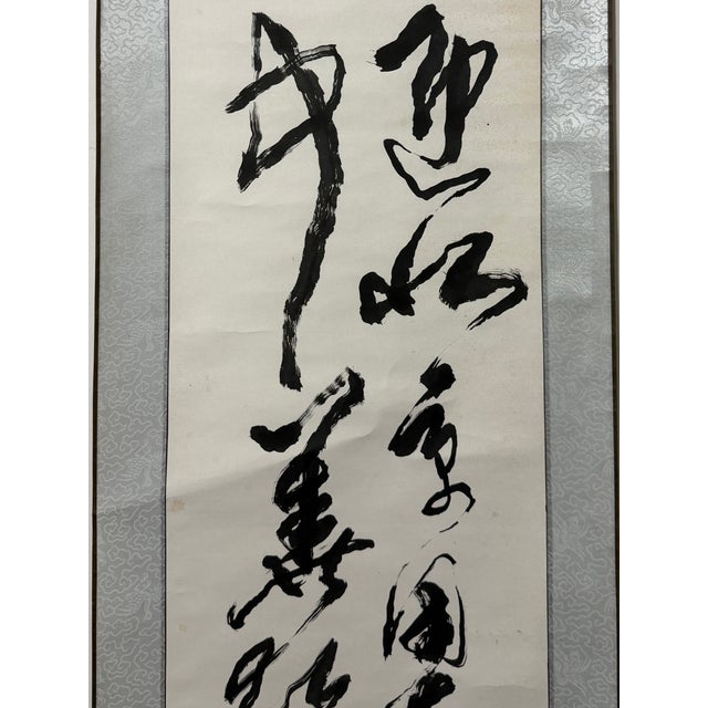 This vintage Chinese handwritten calligraphy hanging scroll is elegant oriental wall decor. Scroll measures 77.0 inches ×...