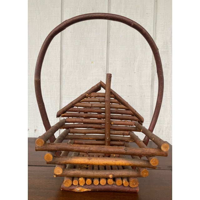 Add some rustic flair to your home with this vintage handmade bentwood basket, shaped like a log cabin. This could be used...