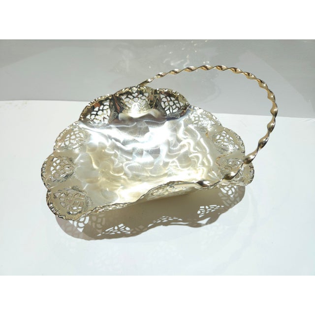 Silver Plated Brass Swing Handle Basket Dish, Silver plated tarnish resistance, made in western Germany. Gorgeous piece...