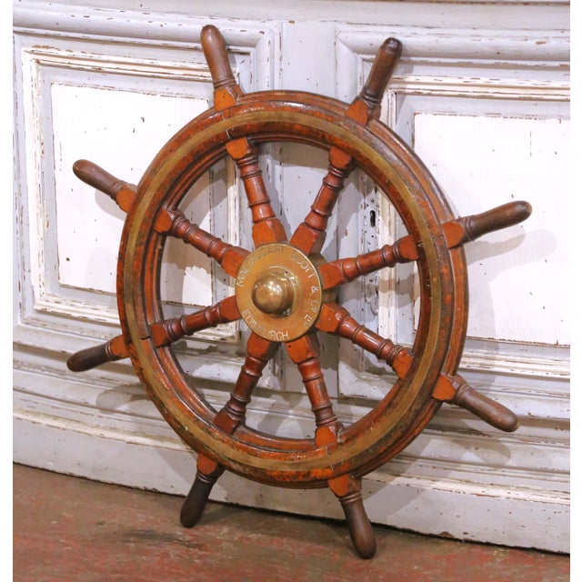 Bring a touch of maritime heritage to your interior with this impressive early 20th-century ship’s wheel. Crafted in...