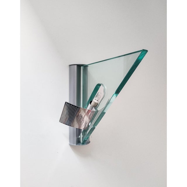Original Artemide Icaro wall sconces, designed by Carlo Forcolini and manufacturated in Italy. These iconic postmodern...