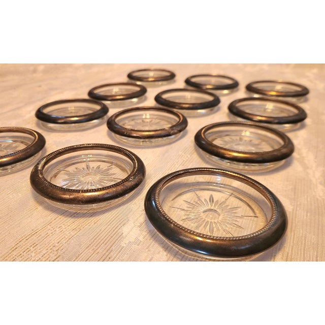 Beautiful Italian glass & silver plate coasters marked "Leonard" & "Silver Plated Italy". This is a sophisticated way to...