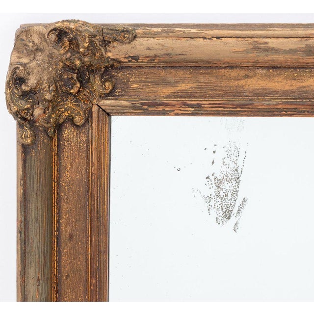 Italian Rococo Style Carved Wood Framed Mirror, with shell motif and distressed finish. Mirror plate: 47.25" H x 27.5" W;...