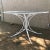 1950s Hollywood Regency, white metal, faux bamboo table with glass top. This chic table would be a wonderful addition on...