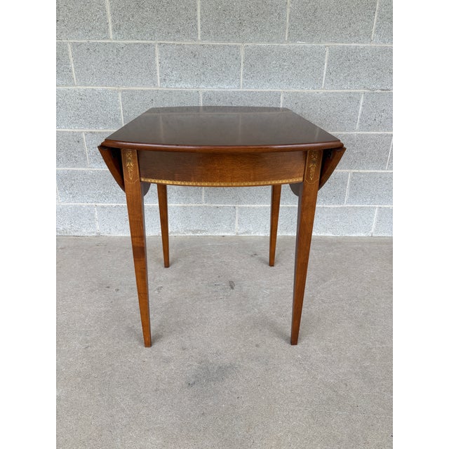 Description: Hitchcock Maple Hepplewhite Style Drop Leaf 42" Dining Table. Harvest Paint Decorated. In Very Good Vintage...