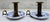 A handsome matched pair of vintage Royal Copenhagen push-up candleholders, also known as chambersticks, combining blue-...