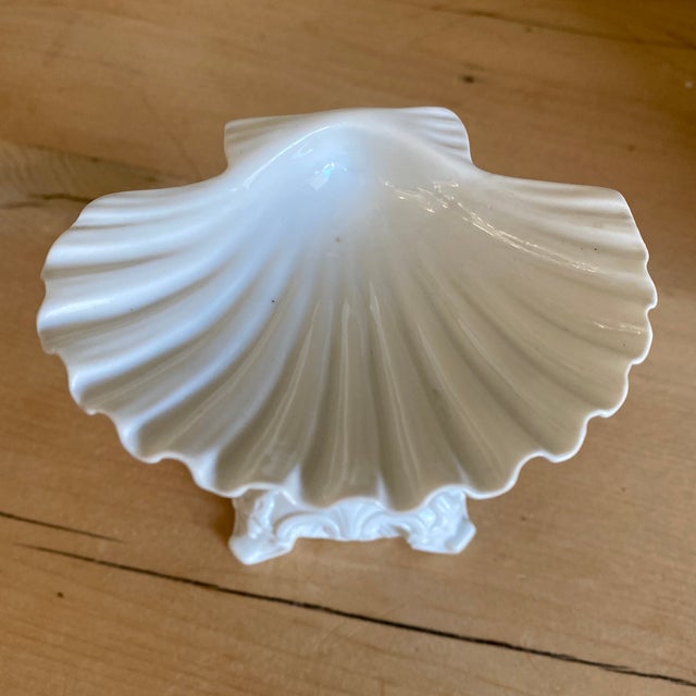 White Italian Porcelain Blanc de Chine Figurative Sea Creature sculpture holding a shell salt cellar. Marked on bottom