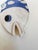 Charming handmade ceramic fish plaque featuring a richly textured blue-and-white glaze and whimsical folk art styling....
