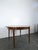 Round Extendable Walnut Table, in Very Good conditions.