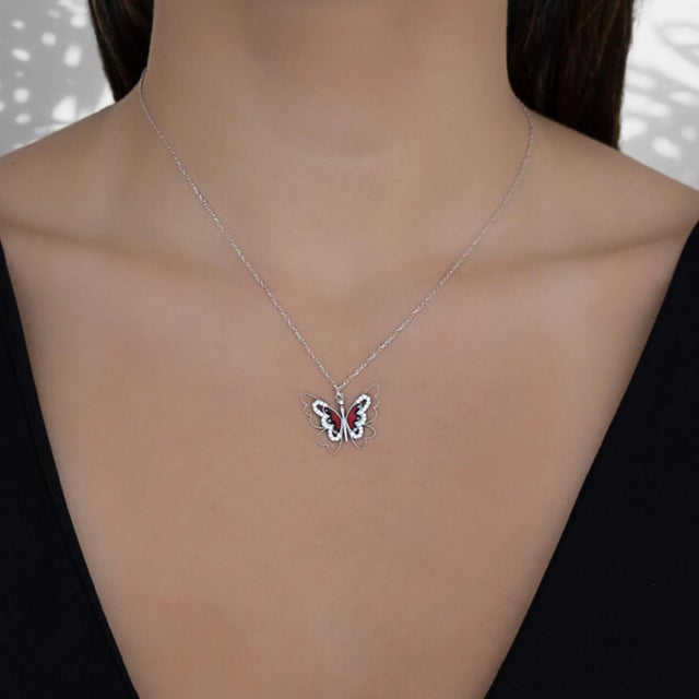 The Peace Red Butterfly Sterling Silver Pendant Necklace, a captivating piece of jewelry that embodies grace, beauty, and...