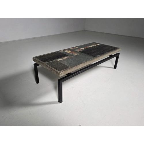 Slate stone mosaic Coffee table by Paul Kingma, 1967. This work features a hand-composed mosaic top made from carefully...