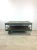 This mid century industrial cart coffee table features painted steel frame, newly refinished wood decking, and custom...