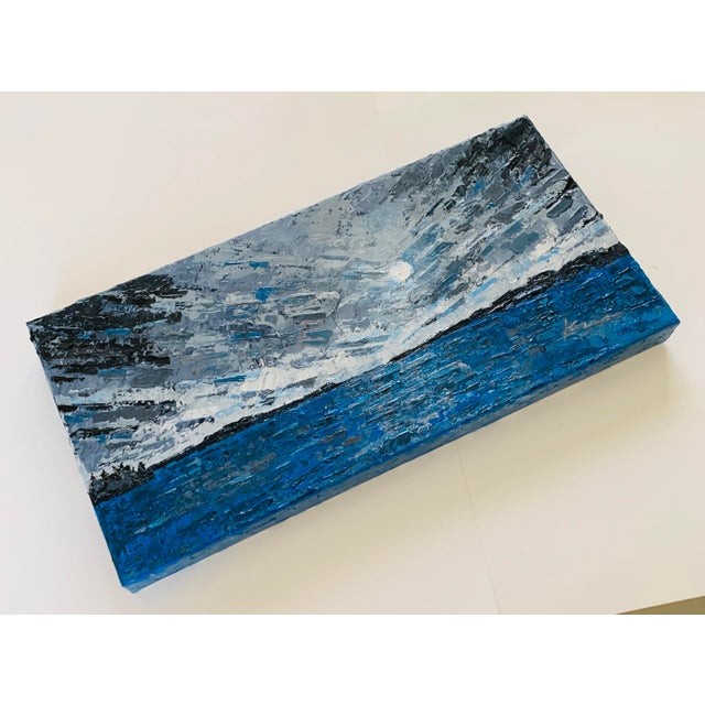 This Palette Knife Abstract Oil Painting....Blue Moon Isle is New and in good condition. Painted in shades of Blue, Black...
