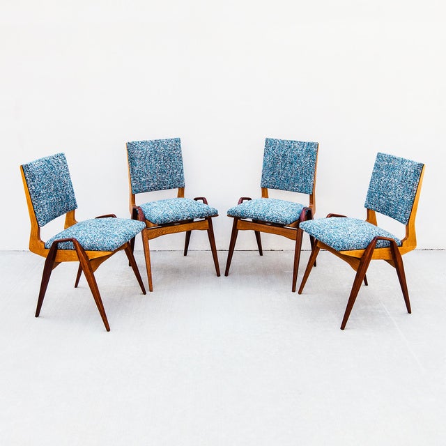 An outstanding set of 1950s French modernist dining chairs by Maurice Pré in a rarely seen combination of white oak and...