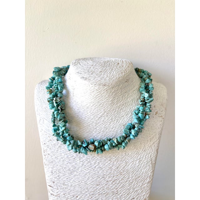 Lovely vintage turquoise beaded necklace features multi strands adjustable chain clasp