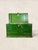 A character-rich antique English pine blanket chest dating to circa 1905, featuring a wonderfully timeworn green painted...