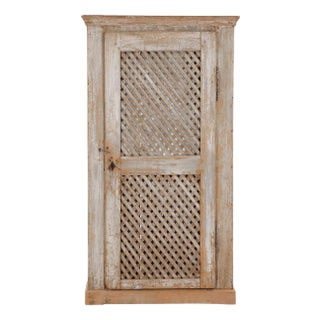 A Rustic Painted Pine One-Door Cabinet, Early 19th C. For Sale