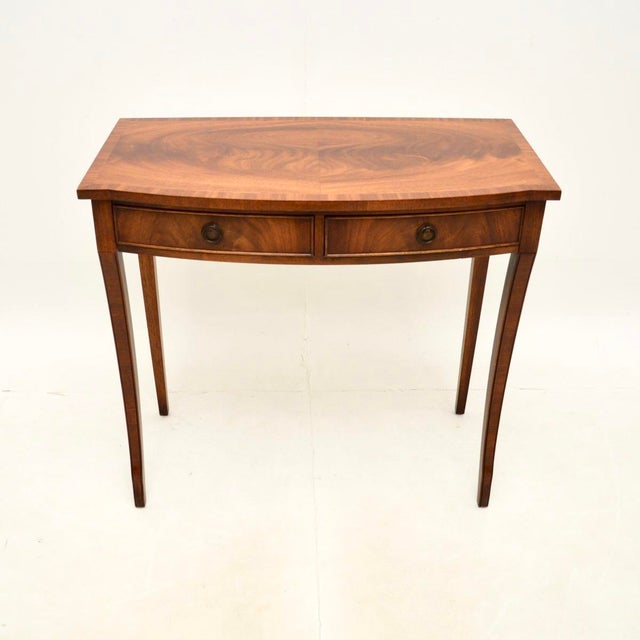 An elegant and very well made antique Regency style console table. This was made in England, it dates from around the...