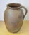 Vintage French Stoneware jug from the Brittany region of France. Hand-made and unglazed. These jugs were used on the dairy...
