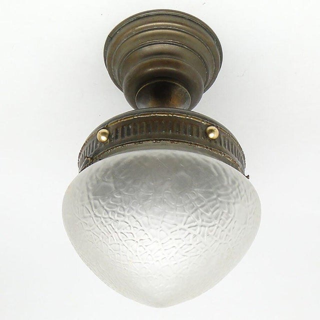 The pendant lamp was produced at the beginning of the twentieth century. It is made in the Art Nouveau style. The...