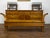 A French Restauration period walnut bench from the early 19th century, with lift-top seat, unusual out-scrolling arms and...
