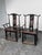 Design Plus Gallery presents a Pair of Antique Chinese Elmwood Armchairs from the Qing Dynasty, Circa 1750. These chairs...