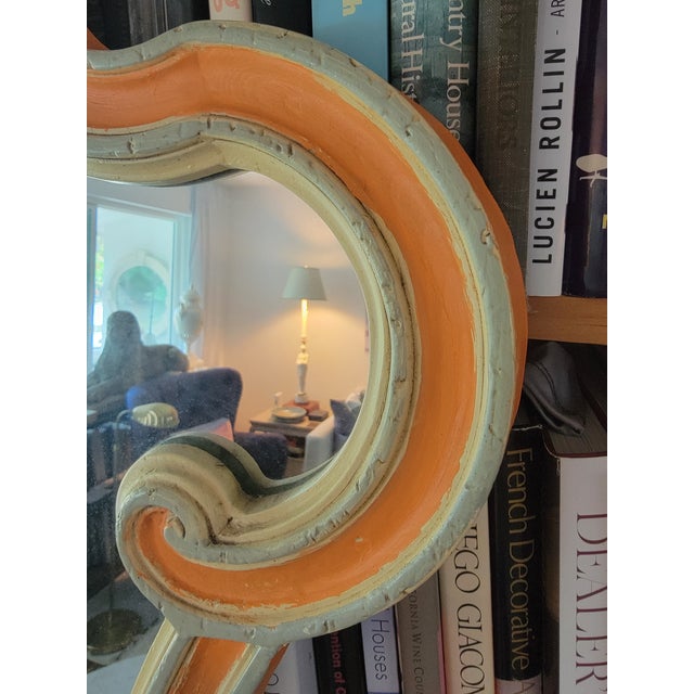 Harlequin wood carved mirror with custom melon ball finish. Mid-century. Solid wood and wood backed