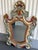 Hand carved mirror with beautiful colors of blue, red, white and gold. The mirror is hand carved, you can see the backside...