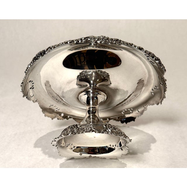 Beautiful pair of late 19th century/early 20th century Tiffany & Co sterling silver compotes. The sloping edge of the tray...