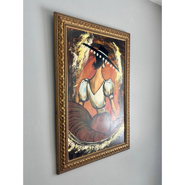 This striking vintage painting from the 1960s depicts a flamenco dancer captured in a moment of dramatic movement and...