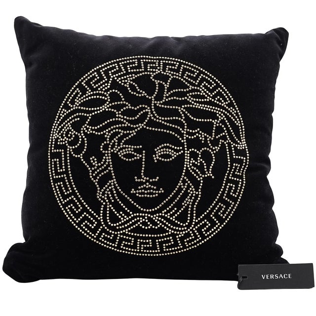 Pair of authentic Versace Home “Medusa” studded cushions, crafted in Italy and presented in rich black velvet with...
