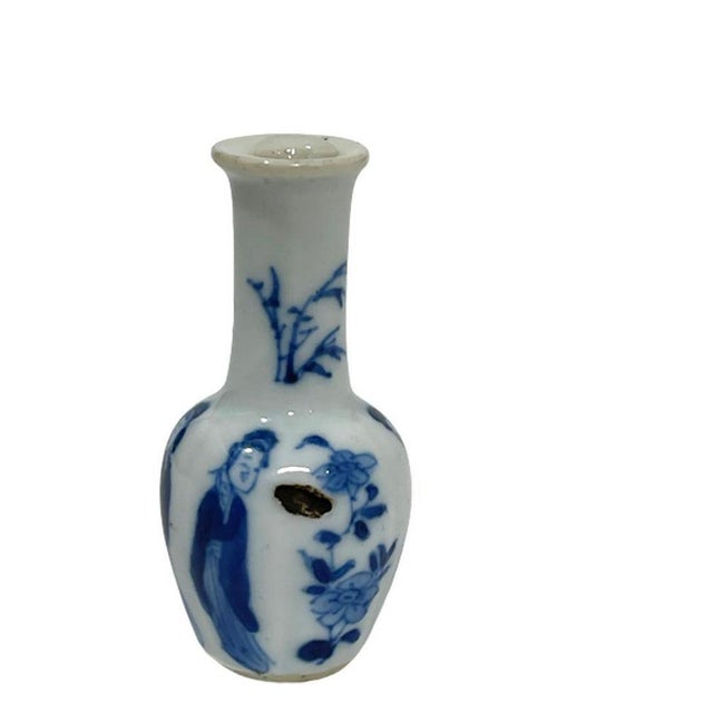 Chinese miniature porcelain blue and white Kangxi vase Kangxi (1662-1722) With a scene of floral decor and long Eliza The...