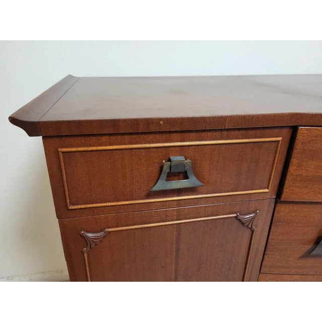 Rway Mahogany Mid Century buffet with metal craftsman brass handles. It has one large drawer with 2 cabinet doors side by...