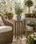 A wonderfully slender American side table constructed from natural branches and bent twigs, with a woven stick top and...
