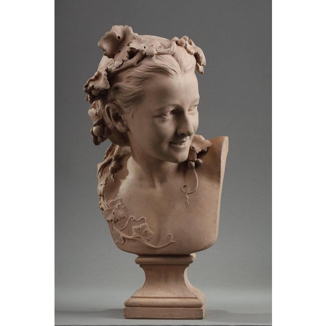 Terracotta bust of L'Espiègle or La Rieuse aux pampres de vignes signed in point JBt CARPEAUX Carpeau property stamp,...