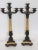 This stylish and chic pair of Charles X candlesticks will make a statement with their form and use of materials.