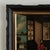 19th century Chinese school oil painting on canvas of scholars in an interior scene. Presented in a parcel gilt ebonized...