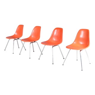 Dining Chairs in Orange Fiberglass on Chrome Metal H-Bases by Charles & Ray Eames for Herman Miller, USA, 1960s, Set of 4 For Sale
