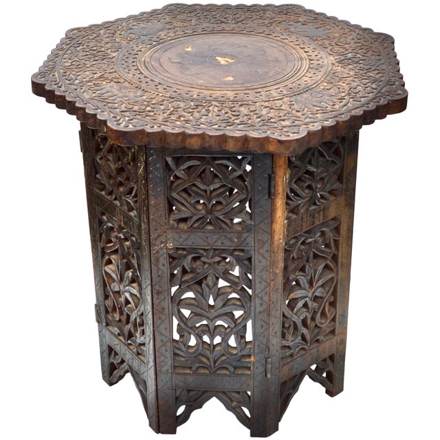Gorgeous antique handcrafted Anglo-Indian accent table featuring an intricate hand-carved solid rose-wood with an ornate...
