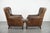 This beautiful set of two armchairs is made of cowhide leather. The armchairs have a distinctive look and are very...
