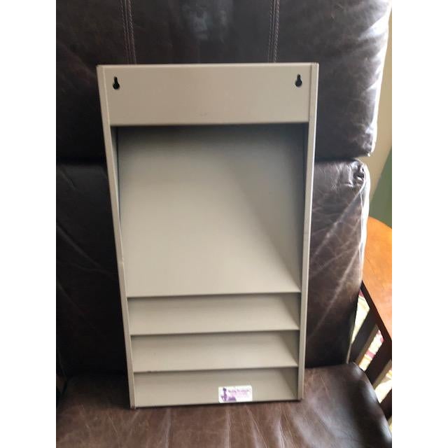 Vintage mid-20th century metal magazine or documents rack. Made of metal - heavy and substantial. Mount on wall - hardware...